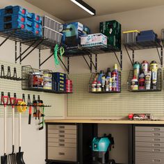 the garage is organized with tools and supplies