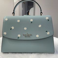 Nwt Kate Spade Embroidered Lea Top Handle Satchel Crossbody Aphrodite $379 7.13"H X 9.63"W X 3.5"D (Bottom) 7.13"H X 9.63"W X 2"D (Top) Handle Drop: 2.88" Strap Drop: 22" Refined Grain Leather Metal Pinmount Logo Two Way Spade Jacquard Lining Interior Front & Back Zip Pocket Exterior Back Slip Pocket Flap With Magnetic Snap Closure Chic Embellished Bags For Spring, Kate Spade Luxury Bags For Spring, Luxury Kate Spade Bags For Spring, Spring Luxury Kate Spade Bags, Spring Embroidered Bag, Stylish School Bags, Girly Bags, Fancy Bags, Pretty Bags