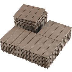 three stacks of wooden boards stacked on top of each other in the shape of squares