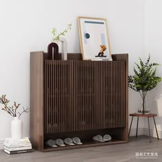 a wooden cabinet with shoes on it next to a potted plant