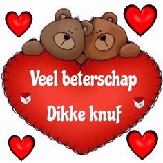 two teddy bears sitting on top of a heart with the words veel beterschap