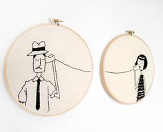 two embroidery hoop paintings depicting a man holding a woman's hand with a string