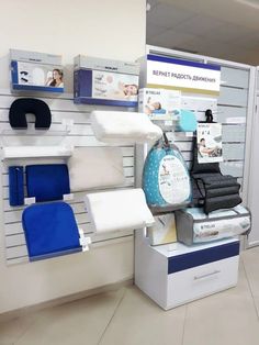 there are many different items on display in the store and one is blue, white, and grey