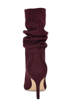 A slouchy shaft adds modern intrigue to a statement-making bootie balanced by a pointy toe and slender heel. 3" heel 8" shaft Pull-on style Synthetic or leather upper/textile and synthetic lining/synthetic sole Imported Burgundy Boots, Steve Madden Heels, Shoe Boutique, 2024 Trends, Fashion Baby, 2023 Fashion, Fall 2024, Shoe Style, Custom Shoes