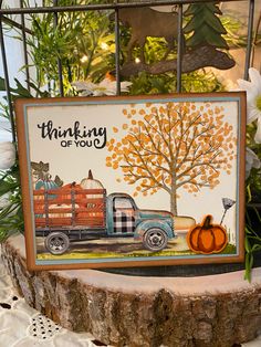 a card that says thinking of you with an image of a truck and pumpkins