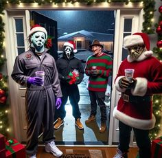 three people dressed up as zombies in front of an open door with christmas decorations on it