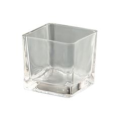 a clear square glass vase on a white background