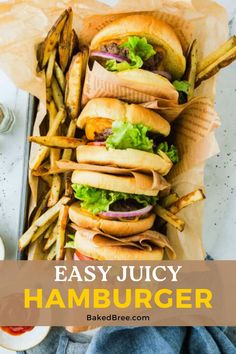 hamburgers stacked on top of each other with the words easy juicy hamburger written above them