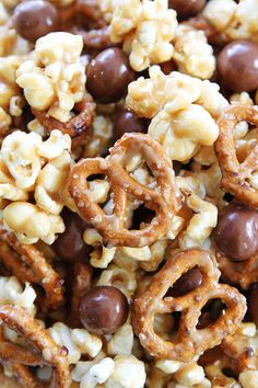 a close up view of some cereal and pretzels