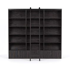 the bookcase is made from dark wood and has four shelves on one side, with two