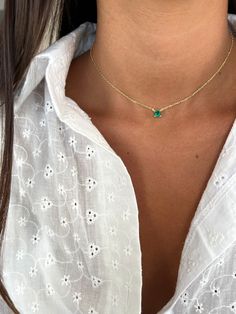 This stunning choker necklace sits elegantly close to the neck, featuring a captivating green solitaire pendant that adds a unique touch of sophistication. Crafted from 925 sterling silver, the necklace is available in both 14K yellow gold and rose gold plating, adorned with a sparkling green zircon stone for a pop of color and brilliance. Perfect for evening events, weddings, or adding a refined detail to everyday outfits, this choker makes a thoughtful gift for a wife, girlfriend, or any speci Round Emerald Necklace As Gift, Sterling Silver Emerald Necklace, Dainty Emerald Necklace With Round Pendant, May Birthstone Necklace With Clavicle Chain, Dainty Emerald Necklace In Sterling Silver As Gift, Fine Jewelry Solitaire Necklace With Delicate Chain For Gift, Dainty Emerald Necklace With Adjustable Chain As Gift, Delicate Chain Emerald Necklace For May Birthstone, May Birthstone Gift Solitaire Necklace With Round Pendant