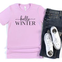 This Hello Winter tee is a perfect way to show your love for all things winter! Wear this super soft and comfortable tee to the coffee shop for your favorite drink, sitting by the firplace, or apres ski! Would be so cute styled with a long skirt to dress it up! Material: 52% Airlume Combed and Ringspun Cotton + 48% Polyester Care: Wash inside out on delicate with cold water. Hang to dry, or tumble dry on low. Cool iron if needed. Do not iron directly on the design. Sizing: This t-shirt is unisex Skirt To Dress, Winter Tees, Hello Winter, Favorite Drinks, Winter Wear, The Coffee, Long Skirt, Cold Water, Coffee Shop