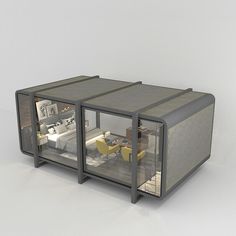 an image of a small house made out of glass and steel with the doors open