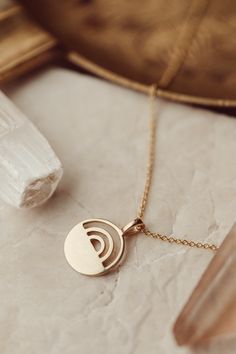 This rainbow necklace can have a lot of meanings, but one of them is to honor your rainbow baby after struggling with infertility. This gold rainbow necklace is the perfect piece to honor your journey #rainbowbaby #infertility #womensupportingwomen Cheap Everyday Pendant Necklaces, Luxury Minimalist Round Pendant Charm Necklace, Cheap Minimalist Pendant Jewelry, Cheap Minimalist Jewelry With Round Pendant, Luxury Minimalist Necklace As Gift, Luxury Minimalist Jewelry With Simple Design, Affordable Casual Pendant Necklace, Cheap Modern Personalized Necklace, Meaningful Necklace Gold