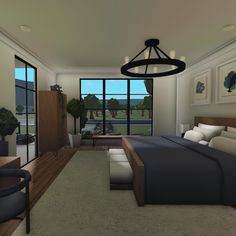 a bedroom with a large bed and lots of windows