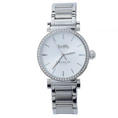 With Swarovski crystals linking the bezel, Coach's Madison watch is more than just a timekeeper-it's a stunning accessory! A high-polished stainless steel bracelet brings a 34mm case to your wrist with an elegant shine. Complemented by the Coach logo, simple hands and hour markers offer the time at a glance. With the Madison atop your wrist, you'll take on the day with a little extra radiance. Elegant Coach Jewelry With Polished Finish, Luxury Coach Watches With Polished Finish, Elegant Coach Watch With Polished Finish, Timeless Silver Coach Jewelry, Luxury Silver Coach Watch, Elegant Silver Coach Watch, Coach Jewelry With Diamond Hour Markers, Silver Diamond Watch With Polished Stainless Steel Finish, Silver Stainless Steel Diamond Watch With Polished Finish