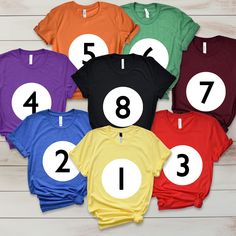 the numbers are printed on t - shirts for children to learn how to read them