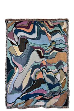 a multicolored rug with fringes on it