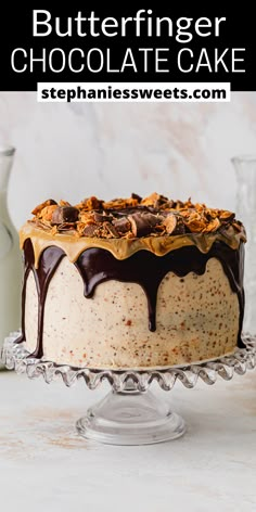 a cake with chocolate icing and nuts on top