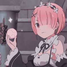 an anime character with pink hair holding a doughnut in her hand and looking at the camera