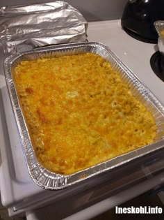 a casserole dish sitting on top of a stove