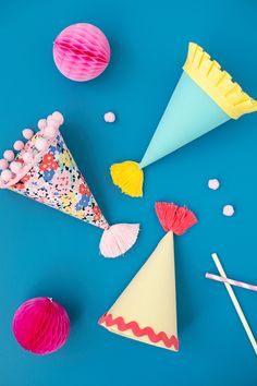 party hats and decorations on a blue background