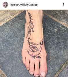 a person has a tattoo on their foot