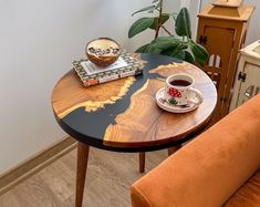 a coffee table with a bowl and plate on it