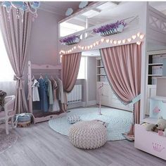 a bedroom with pink curtains and furniture in the room is decorated like a princess's castle