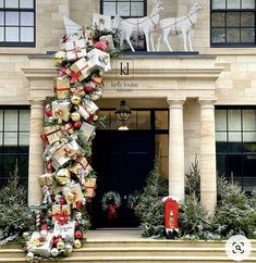 christmas decorations on the front steps of a building