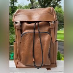 Coach Backpack Coach Brown Standard Backpack, Coach Brown Backpack, Brown Coach Backpack, Designer Travel Backpack With Leather Lining, Coach Brown Backpack For Everyday Use, Designer Leather Backpack For Travel, Everyday Brown Coach Backpack, Coach Brown Backpack For On-the-go, Designer Coach Backpack