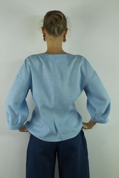 "Write the selected color in the message Handmade sky blue V neck linen blouse with front buttons and long sleeves, perfect for casual wear and suitable for any occasion in any season Details: - 100% natural linen produced in Europe ; - medium weight (180 gram per square meter); - color: sky blue, could be any from our colors catalog (color samples at the photo); Made to order, approximately a few days, If you have any questions please message me and I will be glad to answer. Size guide : Size X Blue Linen V-neck Blouse, Light Blue Tops With Button Cuffs For Daywear, Light Blue Summer Tops With Button Cuffs, Linen Tops With Button Cuffs For Daywear, Light Blue V-neck Blouse For Daywear, Light Blue Long Sleeve Blouse For Daywear, Light Blue Long Sleeve Tops With Button Cuffs, Blue Linen Top With Buttons, Light Wash Linen Button-up Top