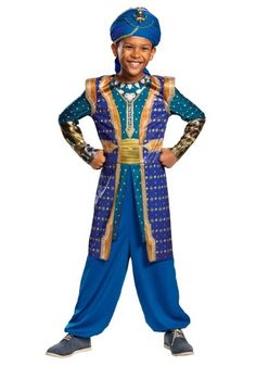 a young boy in a blue and gold costume standing with his hands on his hips