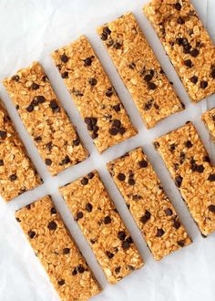 several squares of granola and raisins laid out on top of each other