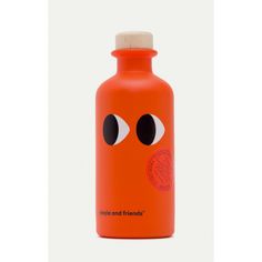 an orange water bottle with eyes on it