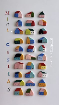 colorful houses are arranged in the shape of magnets on a white surface with words written below them