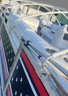 the american flag is painted on the side of a boat's front deck area