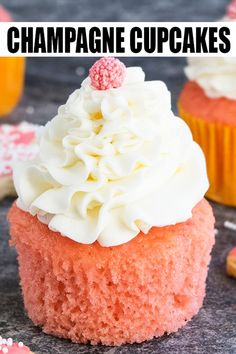 cupcakes with white frosting and pink sprinkles on top are shown