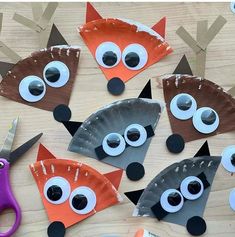 paper plate crafts with scissors and eyes made to look like foxes