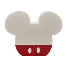 a close up of a mickey mouse shaped object on a white background with red accents