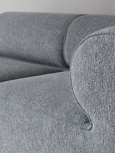 the back end of a gray couch