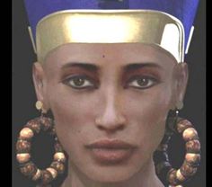 an egyptian woman's head with large earrings