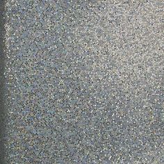 an image of a wall with many small dots on it's surface, as well as the background