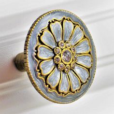 a close up of a ring on a door handle