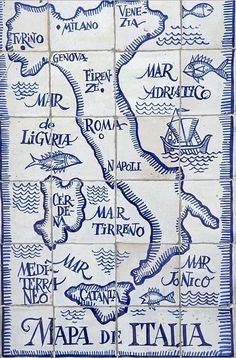 a blue and white tile with the map of italy