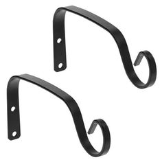 pair of black metal brackets on white background with clippings for use in the kitchen