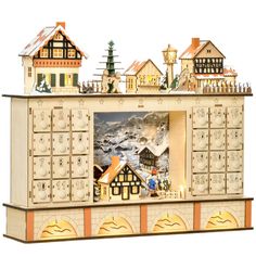 a toy house with lots of windows and decorations on the top floor, in front of a white background