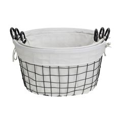 a white basket with black handles on it