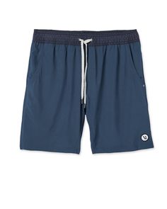 One short for every sport, the Kore Shorts have a classic athletic fit, falling just above the knee with an anywhere and everywhere versatility. Go commando in confidence with the breathable, boxer-brief liner.Also available in 5" and 9" inseam. | Vuori Kore Shorts | Indigo | Small Vuori makes premium performance apparel inspired by the active Coastal California lifestyle; an integration of fitness, surf, sport, and art. Breaking down the boundaries of traditional activewear, we are a new perspe Sporty Recycled Polyester Athletic Shorts For Summer, Navy Athletic Shorts For Summer Workouts, Sporty Navy Swim Trunks For Sports, Navy Activewear With Built-in Shorts For Summer, Sporty Quick-dry Swim Trunks In Recycled Polyester, Blue Cotton Sportswear Shorts, Blue 4-way Stretch Sports Shorts, Blue Moisture-wicking Sporty Swim Trunks, Navy Moisture-wicking Sportswear Shorts