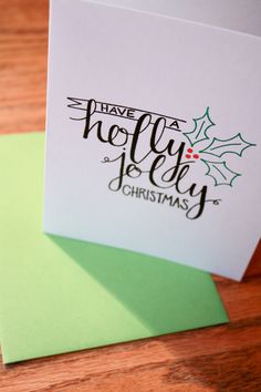 two christmas cards on top of each other with the words have a holly for christmas